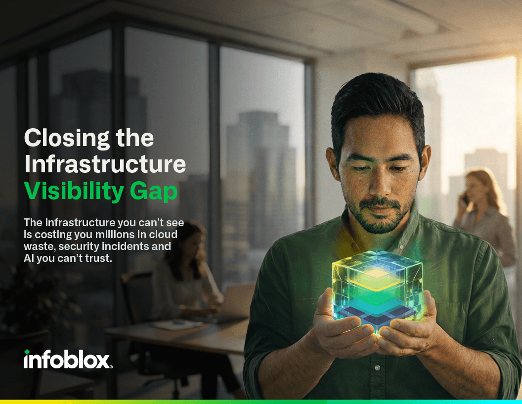 A man in an office holding a glowing cube