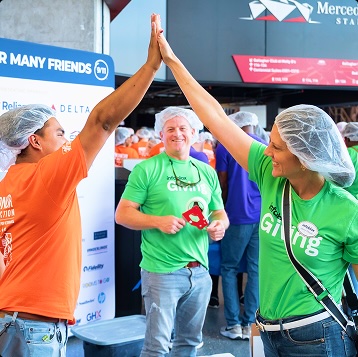 Infoblox employees collaborating during a community engagement event.