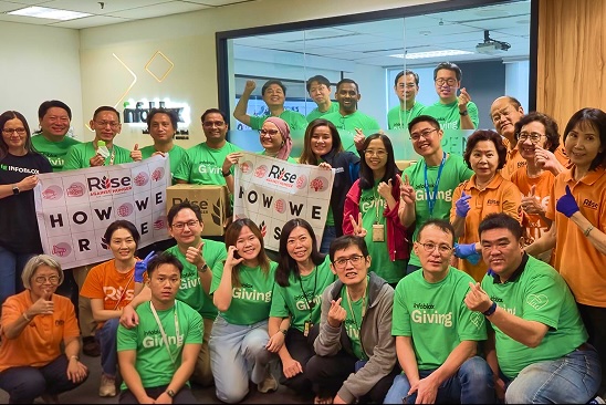 Infoblox employees participating in a community event, reflecting teamwork, belonging, and workplace culture.
